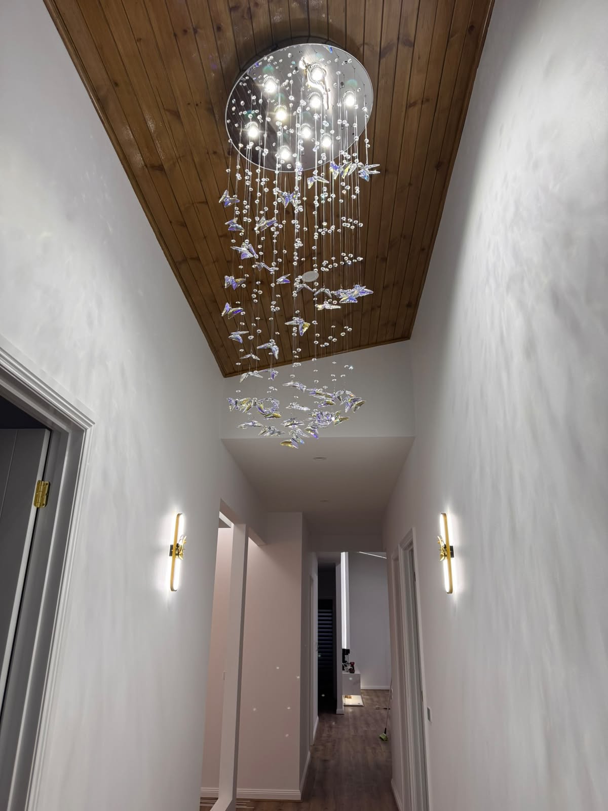 Entry hallway with chandelier