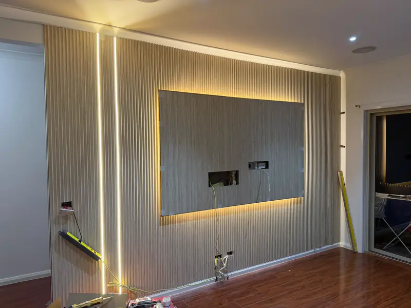 Fluted panel TV feature wall with integrated LED lighting